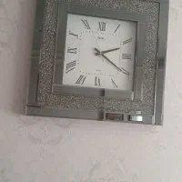 ساعت دیواری نقره ای