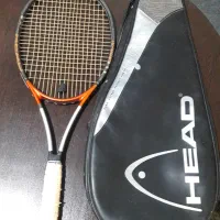 یک عدد راکد تنیس بزرگسال