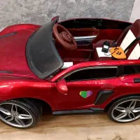 ماشین شارژی قرمز در حد نو