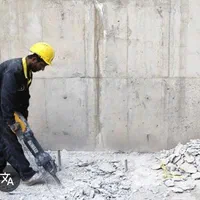 تخریب ساختمان،دیوار و زمین با هلتی