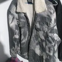 کاپشن باد گیر و تو پشمی دونه ای