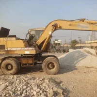 بیل مکانیکی لاستیکی