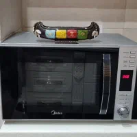 ماکروفر استفاده نشده برند عالی ومعتبرمناسب جهیزیه