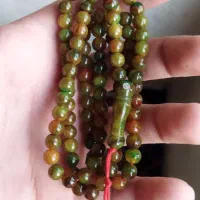 دوتا تسبیح کهربا