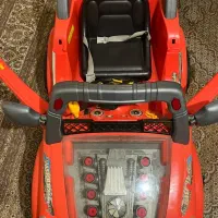 یک عدد ماشین شارژی بچه گانه و یک کرییر