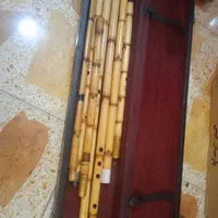 چند عدد نی و جعبه نی|سازهای سنتی|دزفول, |دیوار