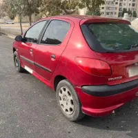 206 آلبالویی مدل 90|خودرو سواری و وانت|شیراز, قالیشویی|دیوار