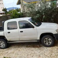 معاوضه باواحدآپارتمانی درالهیه  تویوتا هایلوکس