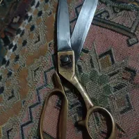 قیچی عطیقع...وتسبیح نقره کوب