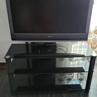 تلویزیون  سونی اصل همراه با میز شیشه ای