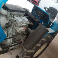 تراکتور کمرشکن 938