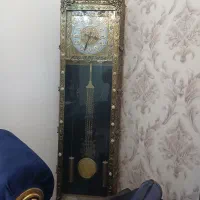 ساعت بوفه و آئینه و شمعدان