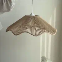 محصولات مکرومه بافی لوستر پرده دیوارکوب بومریس