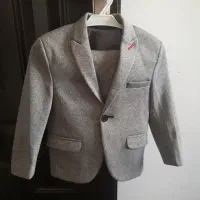 تعدادی لباس بچه گانه و لباس مجلسی