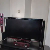 تلویزیون LG زیر تلویزیون همراه سینمای خانوادگی