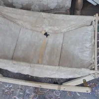 گهواره نونو در حد نو همراه بالشت و پشه بند