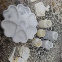 مجسمه و گلدان و مزه خوری