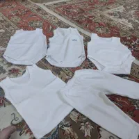 لباس نوزاد|کفش و لباس بچه|قم, قلعه یزدیها|دیوار