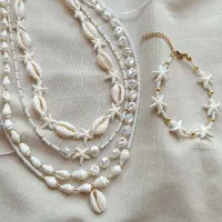 ست گردنبند و دستبند صدفی