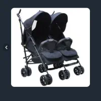 کالسکه دوقلویی مشکی رنگ.