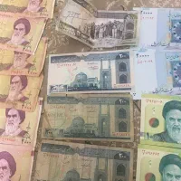 تعدای اسکناس های قدیمی و سکه محمد رضا شاه