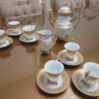 دو دست فنجان قهوه خوری
