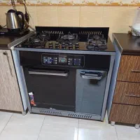 گاز پنج شعله ای صفحه ای و میز تلوزیون درحد