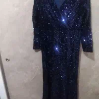 تعدادی لباس مجلسی و کت شلوار مردانه