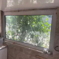 پنجره دوجداره با شیشه