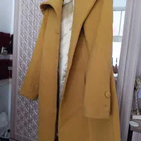 یه عدد پالتو جنسش