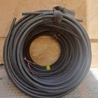 شلنگ آبیاری و باغ