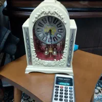 ساعت کوکی قدیمی وماشین حساب