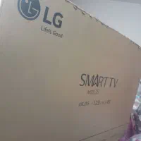 تلوزیون ۴۹ اینچ ال جی آک با میز