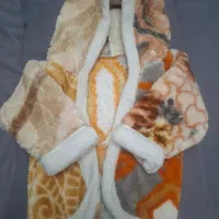 کاپشن  گرم بچگانه