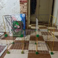 قفسه فلزی واسه کتابخانه .قفسه ی عروسک