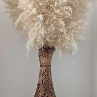 گل طبیعی و گلدان خیلی بزرگ