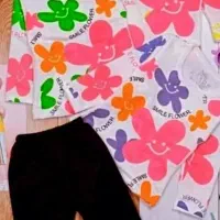 بلوز گل دار شلوار مشکی سایز۴۵و۵۰