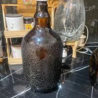 تعدادی بطری شیشه ای در دار|ظروف سرو و پذیرایی|مشهد, نیروی هوایی|دیوار