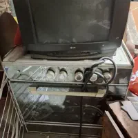 تلویزون رنگی ۲۴ با اجاق گاز چندین شعله