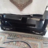 زیر تلویزیونی شیشه ای