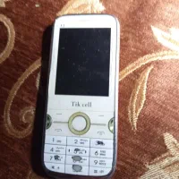 گوشی دو سیم کارت ورم خور.ودوعدد شارژر اصلی