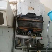 تاسیسات و خدمات فنی میرزایی|آبگرمکن، پکیج، شوفاژ|بومهن, |دیوار