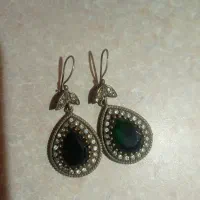 گوشواره های بسیار زیبا و ارزشمند با سنگ زبرجد