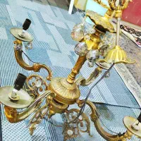 لوستر برنجی سنگین.آینه شمعدان  .یک عدد ساعت قدی