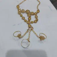 گوشواره 11گرم دستبند /18/5گرم 200 بالای تابلو