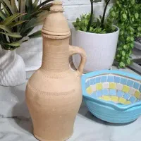 کوزه گلی و حوضچه ماهی