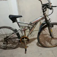 دوچرخه بیست و یک دنده سه کمکه