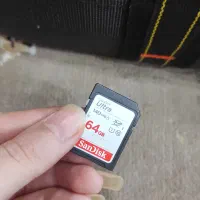 فروش کارت حافظه 64گیگ وکیف دوربین کنون