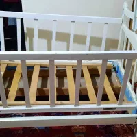 تخت نوزادی کنار مادر