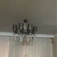 کمدفلزی ودوربین مداربسته وگلدان ولوستروبخارشوی